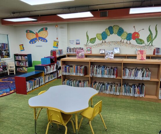 Zelienople Library A children's library with colorful tables and chairs.