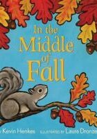 Zelienople Library A gray squirrel sits on a tree branch with red, orange, and yellow fall leaves against a blue background. The book title reads “In the Middle of Fall.”.
